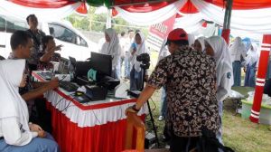 Ikuti Rangkaian Penutupan TMMD, Disdukcapil Beri Layanan Perekaman E-KTP