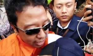 Keluar dengan Rompi Oranye, Romi Mengaku Dijebak