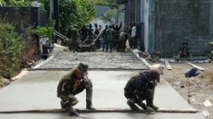 Di Tangan TNI ini, Pengecoran jalan TMMD Sempurna