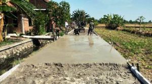 Jalan TMMD Diharapkan Meningkatkan Perekonomian Warga