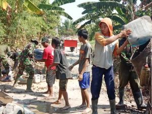 Dansatgas TMMD Kodim Demak Wujudkan Impian Warga Dukuh Duduk