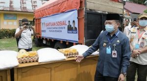 Bupati  Al Haris Salurkan Bantuan Dampak Covid-19 Untuk Warga Pematang Kandis Bangko