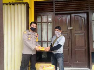 Kapolres Merangin Salurkan Bantuan Melalui IWO