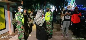 Sinergitas TNI dan Polri Himbau Warga Untuk Bersama Perangi Virus Corona