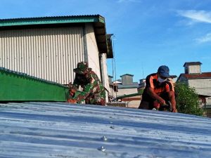 Panas Terik Matahari, Tak Surutkan Semangat Personel TMMD 108 Kodim Tanjab