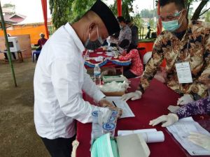 Paslon Bupati dan Wakil Bupati Tanjabtim Nomor Urut 01 Mencoblos di TPS 03