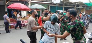 Bagikan Ribuan Masker di Tungkal, Dandim dan Kapolres Ingatkan Pandemi Belum Berakhir