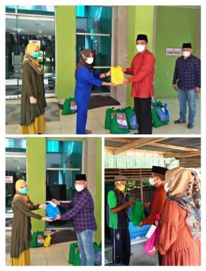 Polres Merangin Bagikan Bansos ke PKL dan Tenaga Kesehatan